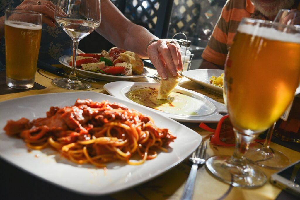 Picture of plates of food and glasses of drinks